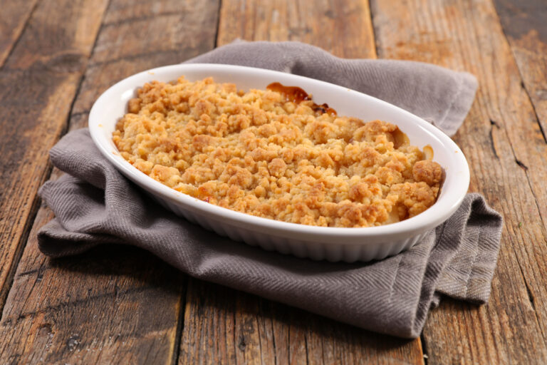 Apple crumble with an oat topping in a baking dish