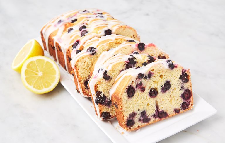 Sliced blueberry lemon pound cake with lemon glaze