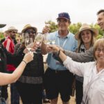 A photograph from a previous Sunstone STOMP harvest celebration
