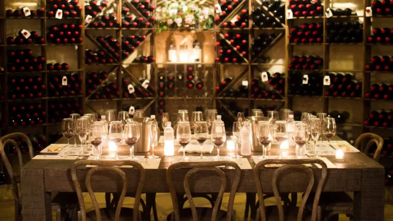 A candlelit tasting table in Linda's Library at Sunstone Winery