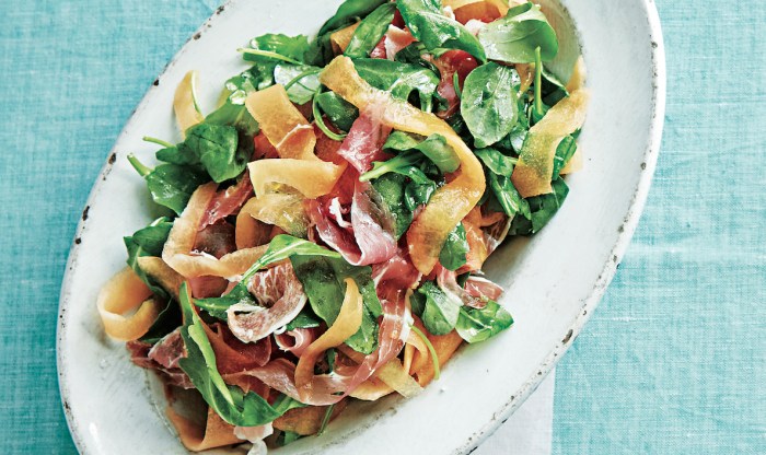 Arugula and melon salad with crisp prosciutto and goat cheese