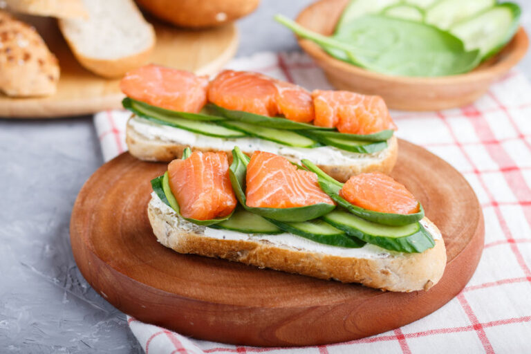 Smoked salmon and cucumber bites on toasted sourdough squares