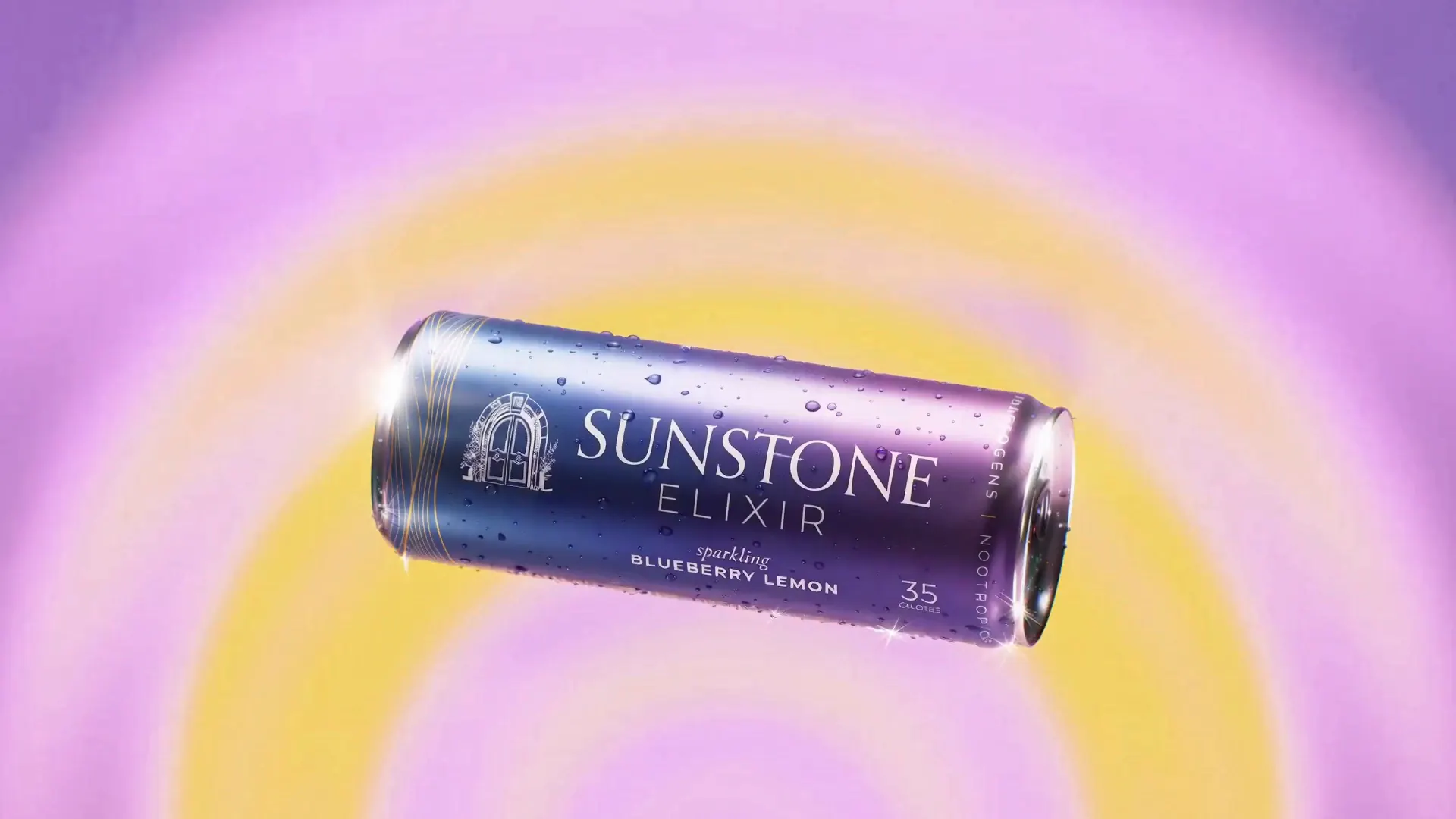 The Sunstone Elixir can turning on a violet and yellow ripple, with blueberries and lemon slices